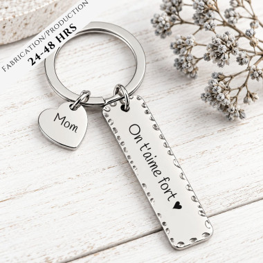 THE HEART-SHAPED KEY CHAIN AND STYLISH SILVER PLATE